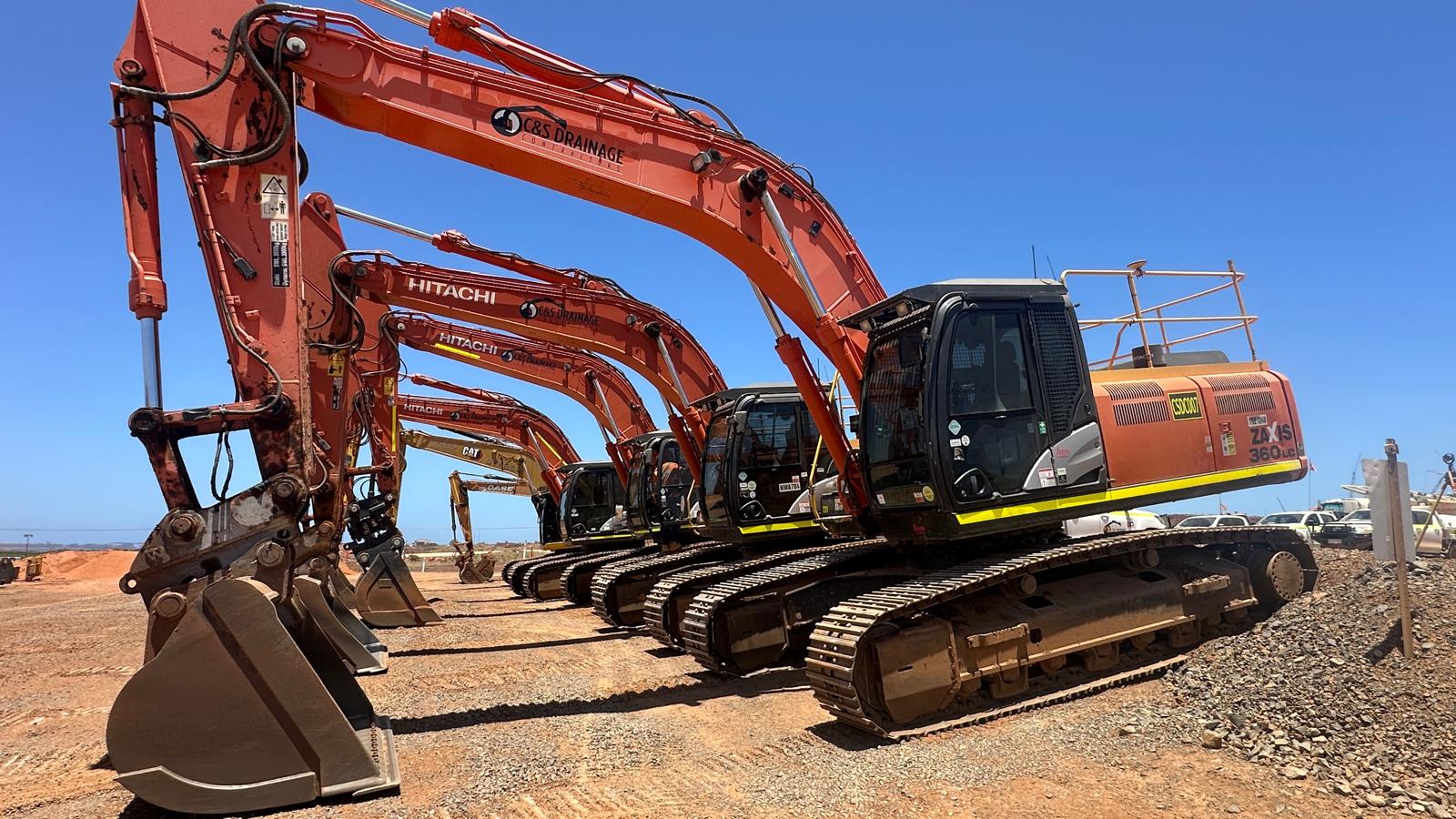 C&S Drainage excavator fleet lined up on site